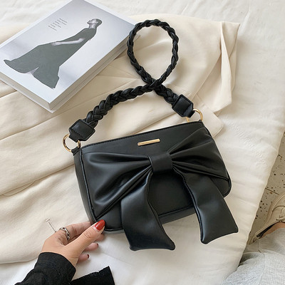 Moderna ženska torba na rame s trakom