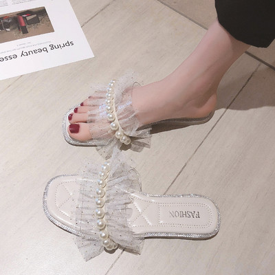 Moteriškos šlepetės plokščiu padu ir perlų elementu