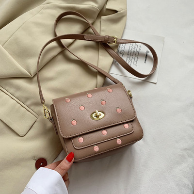 Ležerna ženska torba s vezom i dugom ručkom