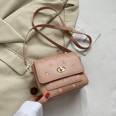 Ležerna ženska torba s vezom i dugom ručkom