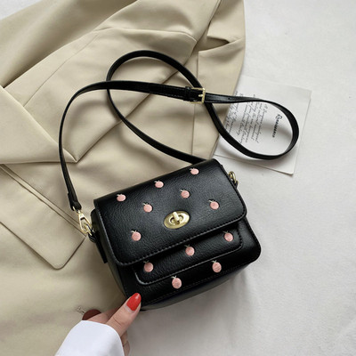 Ležerna ženska torba s vezom i dugom ručkom