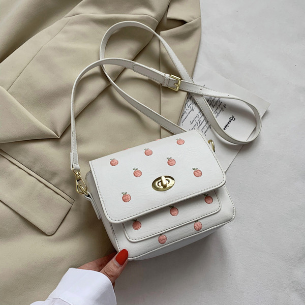 Ležerna ženska torba s vezom i dugom ručkom