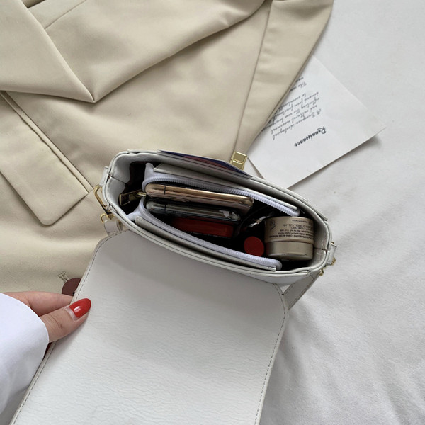 Ležerna ženska torba s vezom i dugom ručkom