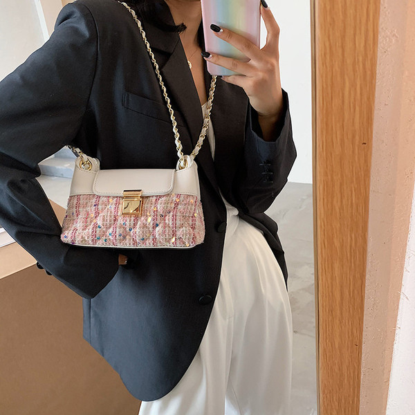 Mala ženska torbica sa šljokicama i dugom ručkom