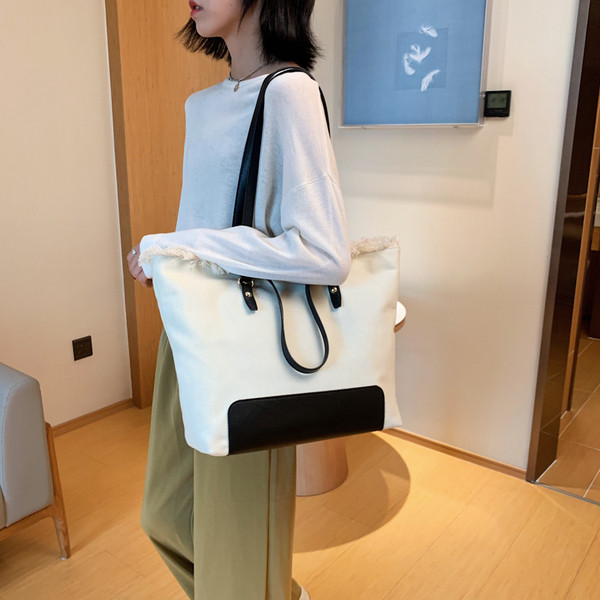 Ležerna ženska torba širokog modela