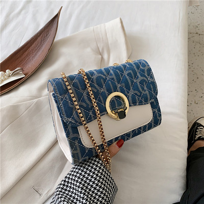 Stílusos női táska műbőr csattal