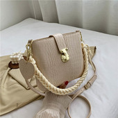 Női alkalmi táska eko bőrből, hosszú füllel