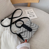 Stílusos női mini táska kerek fogantyúval