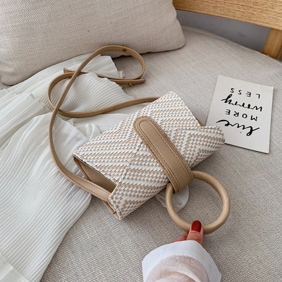 Stílusos női mini táska kerek fogantyúval