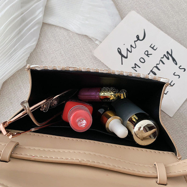 Stílusos női mini táska kerek fogantyúval