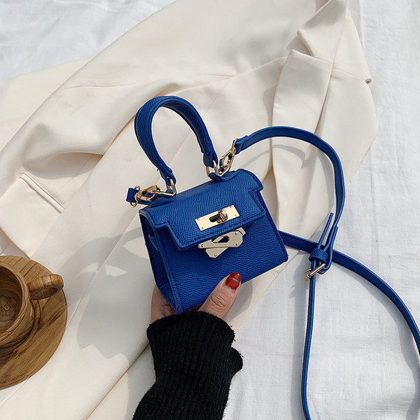 Casual ženska mini torba od eko kože sa kratkom ručkom