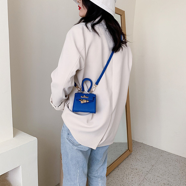 Casual ženska mini torba od eko kože sa kratkom ručkom