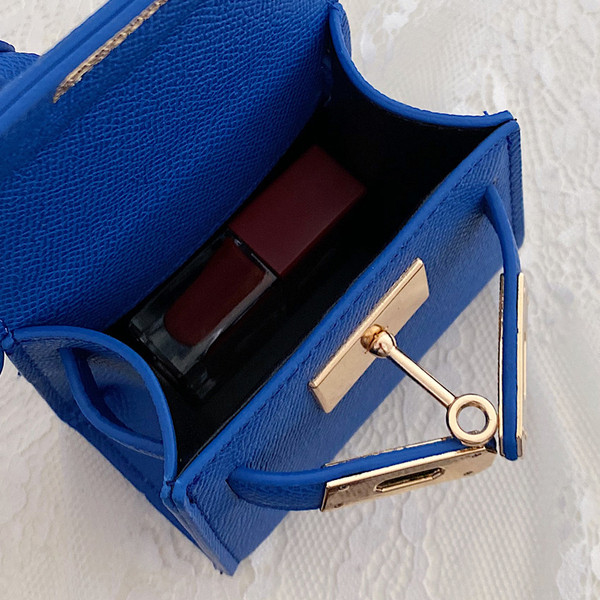 Casual ženska mini torba od eko kože sa kratkom ručkom