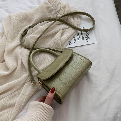 Női táska eco bőrből készült sima modell, rövid fogantyúval