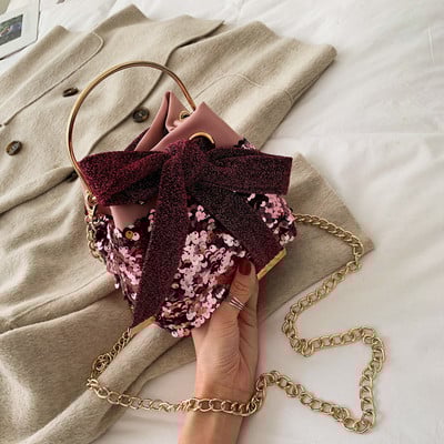 Modern női táska rövid fém fogantyúval és flitterekkel