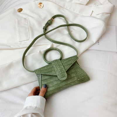 Eko bőrből készült stílusos női mini táska kerek fogantyúval