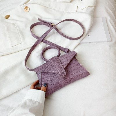 Eko bőrből készült stílusos női mini táska kerek fogantyúval