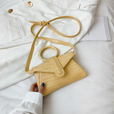 Eko bőrből készült stílusos női mini táska kerek fogantyúval