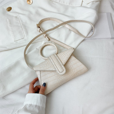 Eko bőrből készült stílusos női mini táska kerek fogantyúval