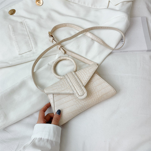 Eko bőrből készült stílusos női mini táska kerek fogantyúval