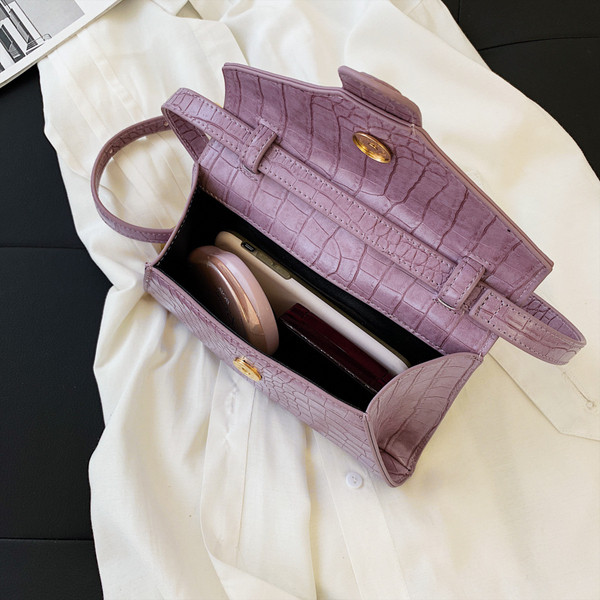 Eko bőrből készült stílusos női mini táska kerek fogantyúval