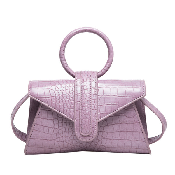 Eko bőrből készült stílusos női mini táska kerek fogantyúval