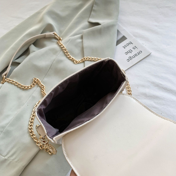 Aktuális női mini táska eco bőrből, csattal