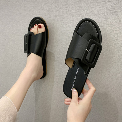 Női bőr papucs nagy csattal