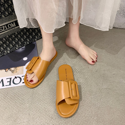 Női bőr papucs nagy csattal