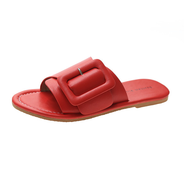 Női bőr papucs nagy csattal