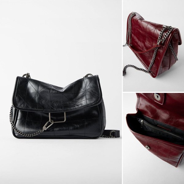 Női bőr válltáska fém fogantyúval