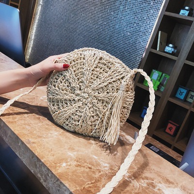 Naiste moodne ümmargune pika sangaga kootud kott