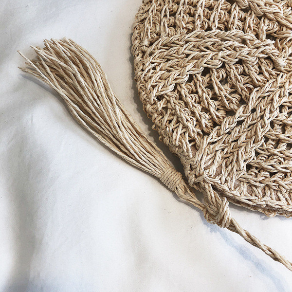 Naiste moodne ümmargune pika sangaga kootud kott