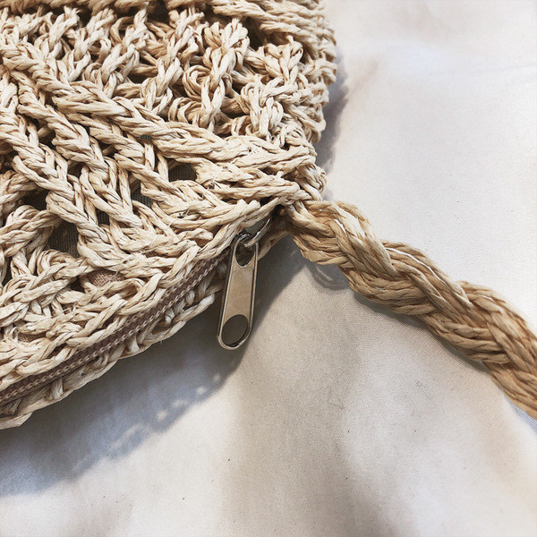 Naiste moodne ümmargune pika sangaga kootud kott