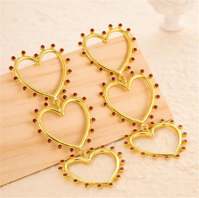 Női lógó fülbevaló arany színű szívecskékkel