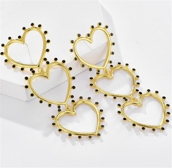 Női lógó fülbevaló arany színű szívecskékkel