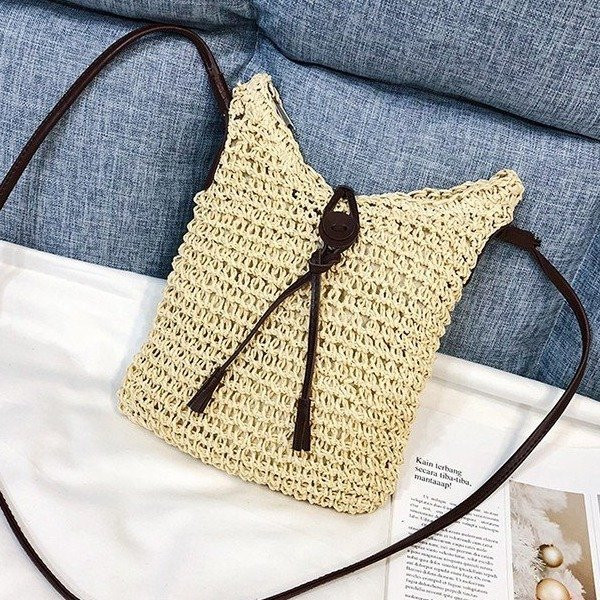 Moteriškas laisvalaikio rankinės platus modelis su kaklaraiščiais