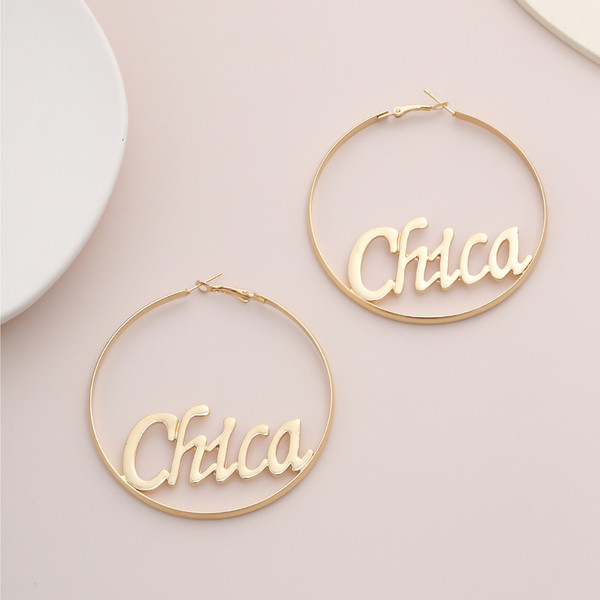 Kör alakú női fülbevaló, felirattal