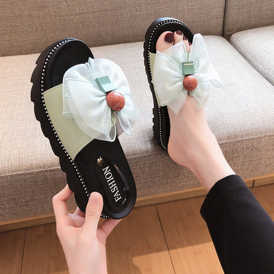 Női papucs szalagos elemmel