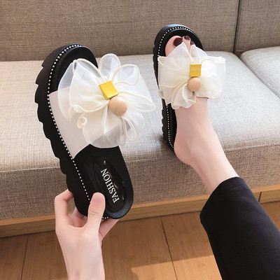 Női papucs szalagos elemmel