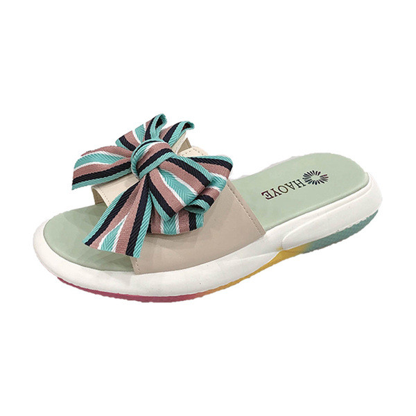 Női papucs színes szalaggal strandoláshoz