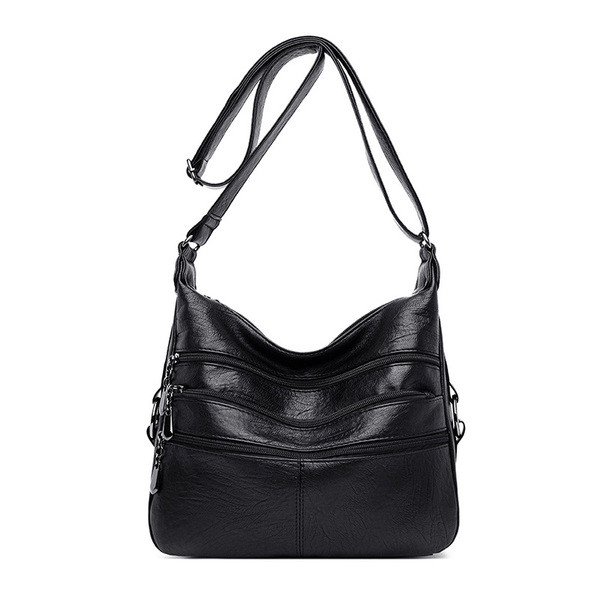 Korszerű női táska hosszú füllel és zsebekkel