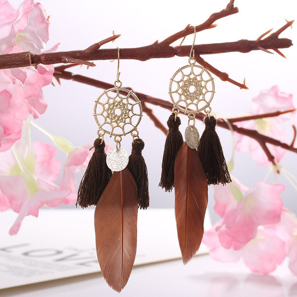 Naiste unistuste lõksu kujulised kõrvarõngad