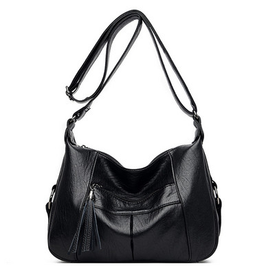 Lezser női táska hosszú füllel és bojttal