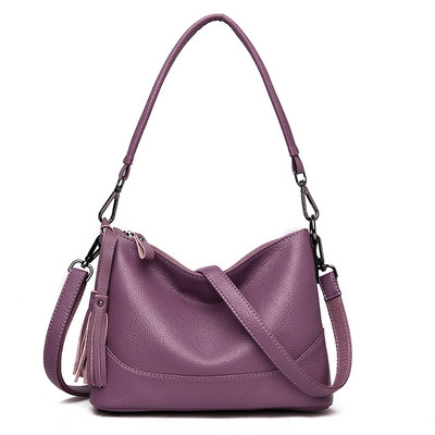 Alkalmi bőrtáska hosszú füllel és bojttal