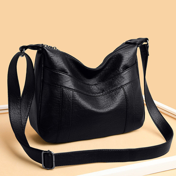 Női bőrtáska sima modell hosszú nyéllel