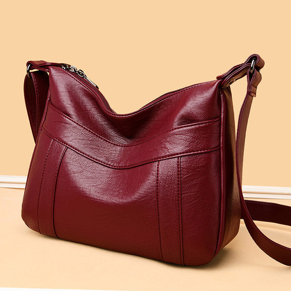 Női bőrtáska sima modell hosszú nyéllel