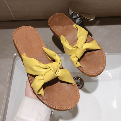 Lapos talpú, szövetpántos női papucs