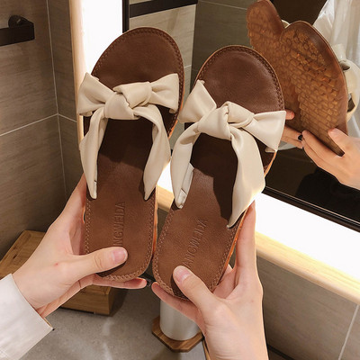 Lapos talpú, szövetpántos női papucs