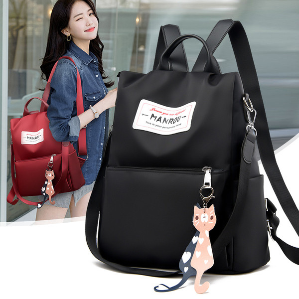 Női alkalmi hátizsák elülső zsebbel és kiegészítővel